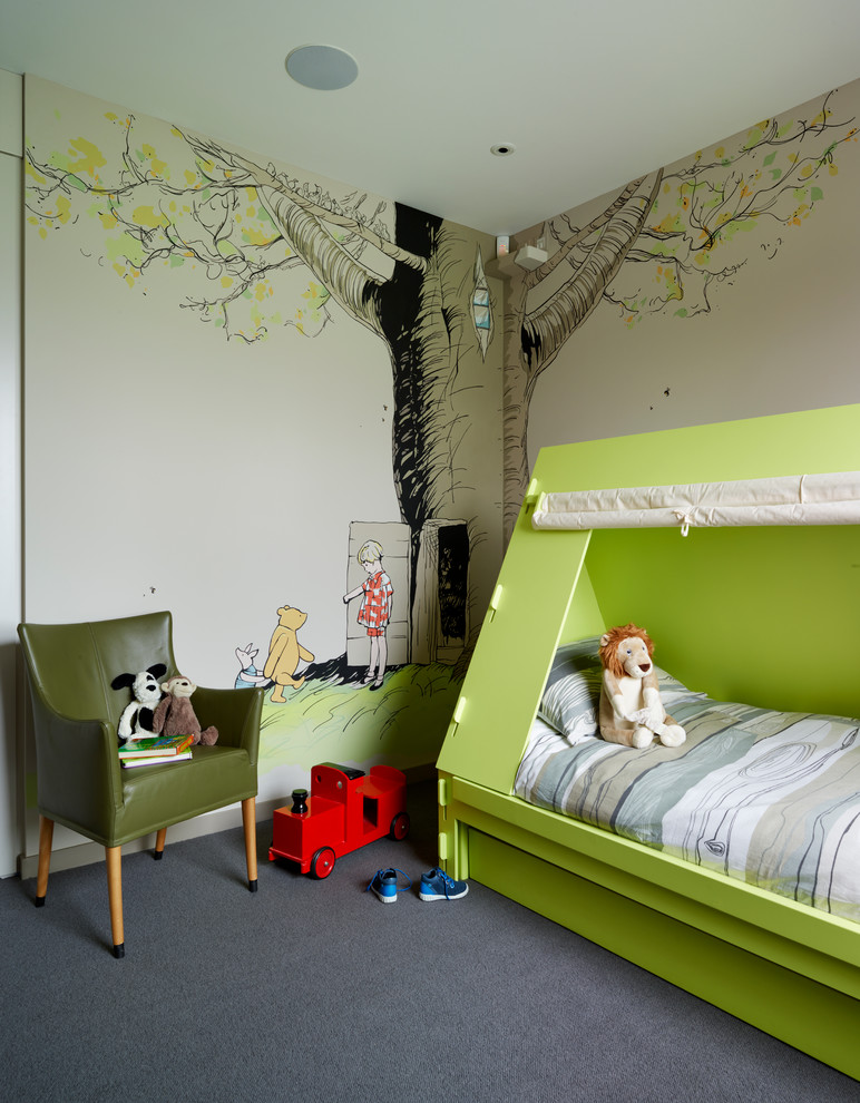 Mid-sized contemporary gender-neutral kids' bedroom in London with carpet for kids 4-10 years old.