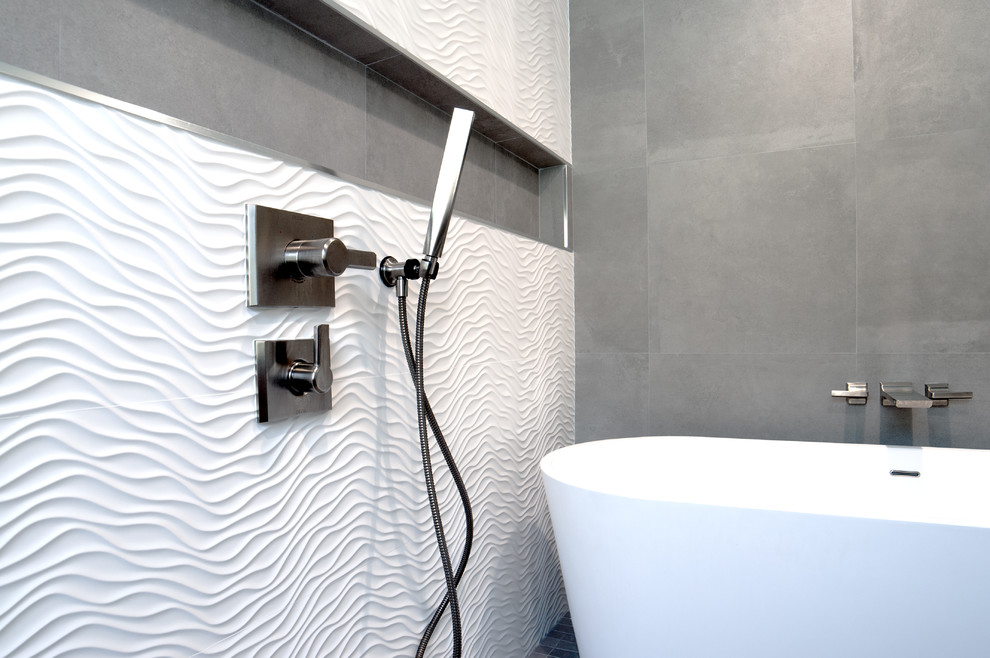 Inspiration for a mid-sized modern master wet room bathroom in Orlando with shaker cabinets, brown cabinets, a freestanding tub, a two-piece toilet, white tile, porcelain tile, white walls, ceramic floors, a drop-in sink, quartzite benchtops, grey floor, a sliding shower screen and white benchtops.