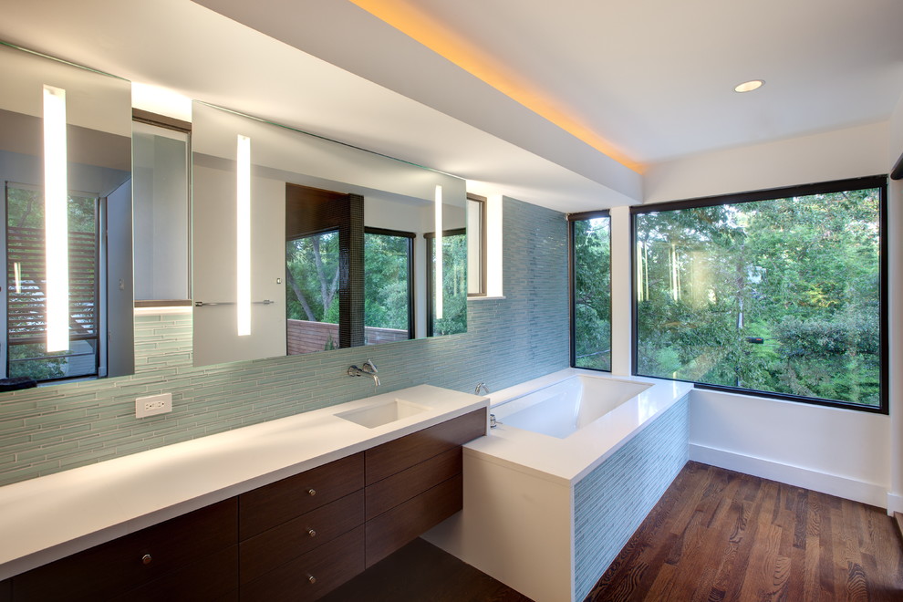 This is an example of a contemporary bathroom in Austin with an undermount sink.