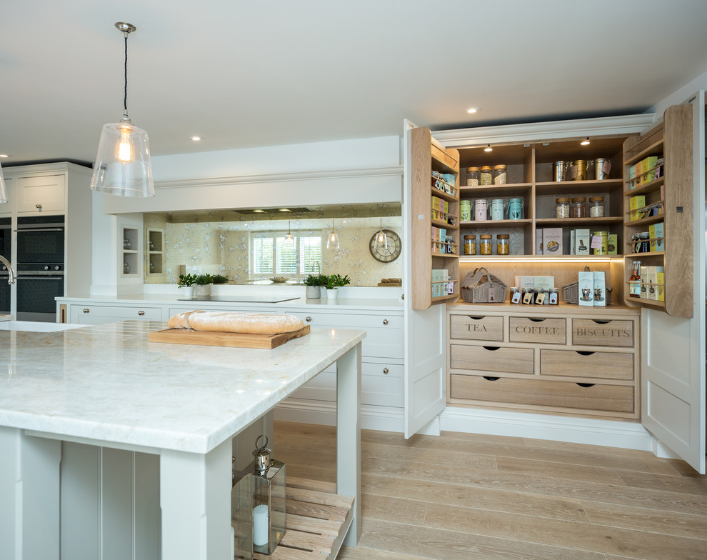 Design ideas for a transitional kitchen in Berkshire.