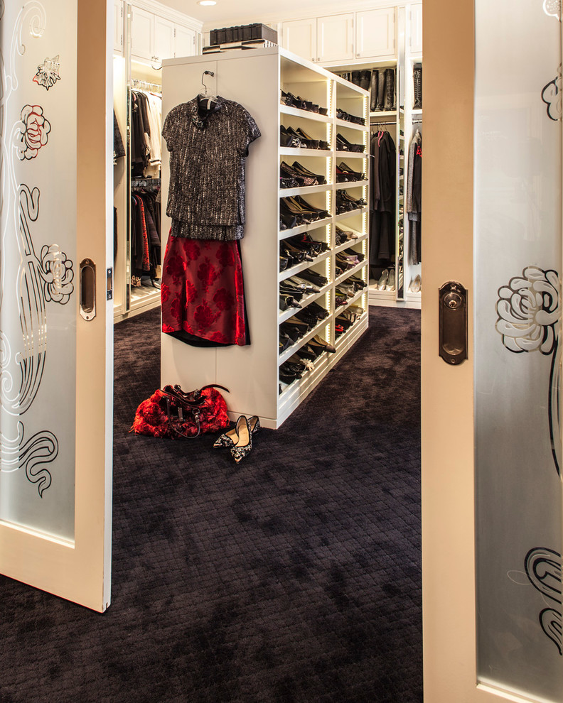 Inspiration for a large contemporary closet remodel in New York with shaker cabinets