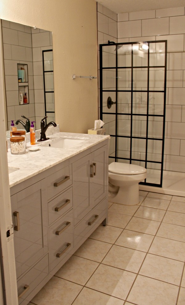 Small transitional master bathroom in Dallas with shaker cabinets, grey cabinets, an open shower, white tile, ceramic tile, an undermount sink, marble benchtops and an open shower.