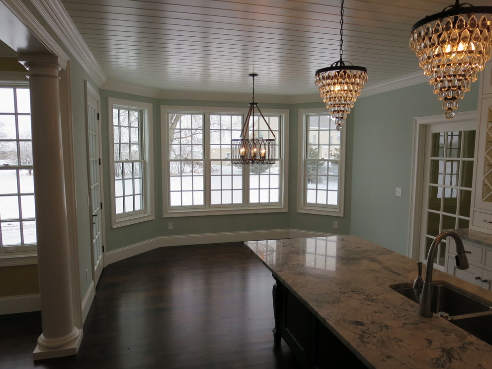 Example of a trendy dark wood floor home design design