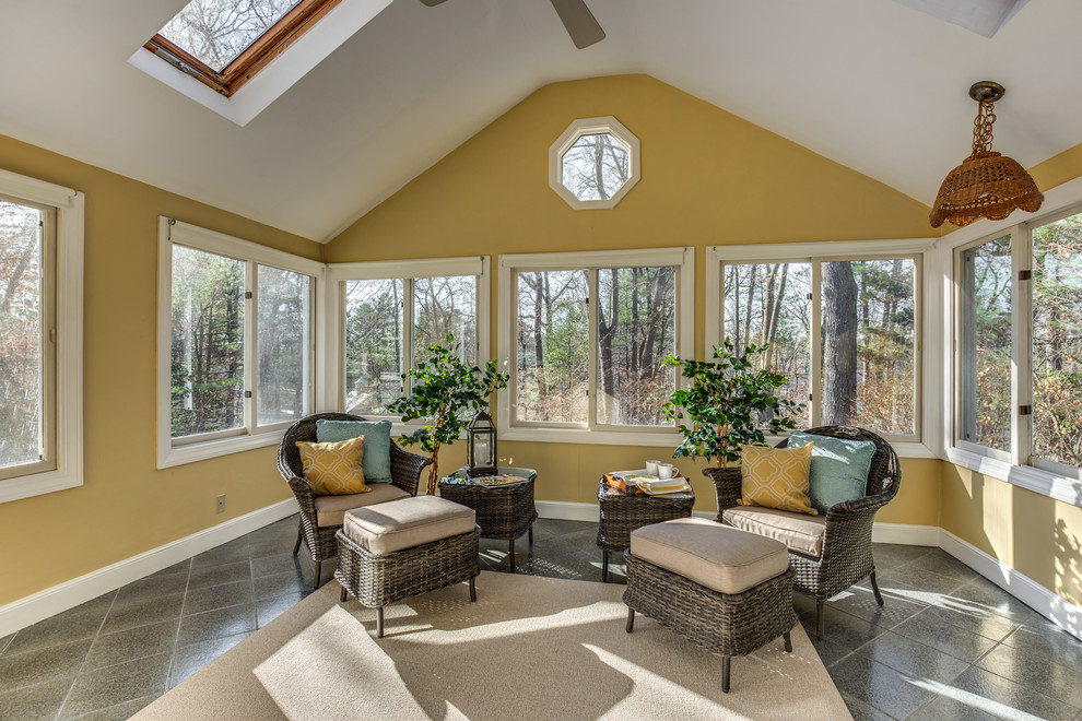 This is an example of a transitional sunroom in Boston.