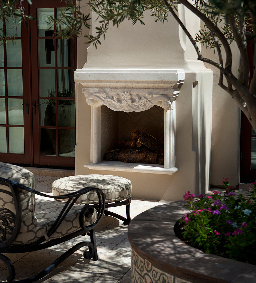 Example of a huge transitional courtyard patio fountain design in Phoenix