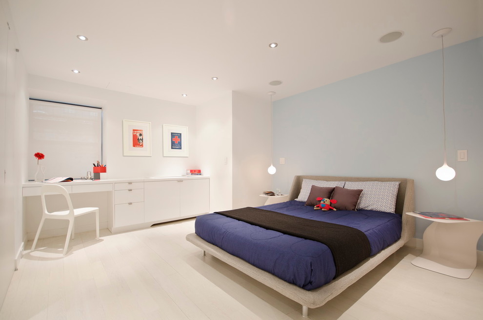 Modern kids' room in New York with grey walls, light hardwood floors and white floor.