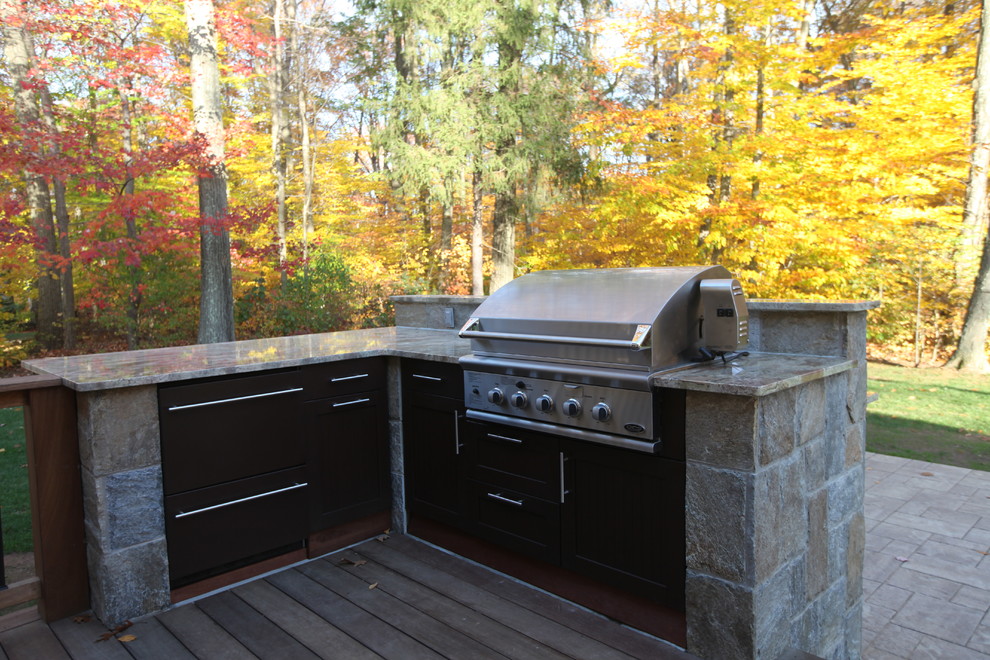 Design ideas for a traditional patio in Bridgeport with an outdoor kitchen.