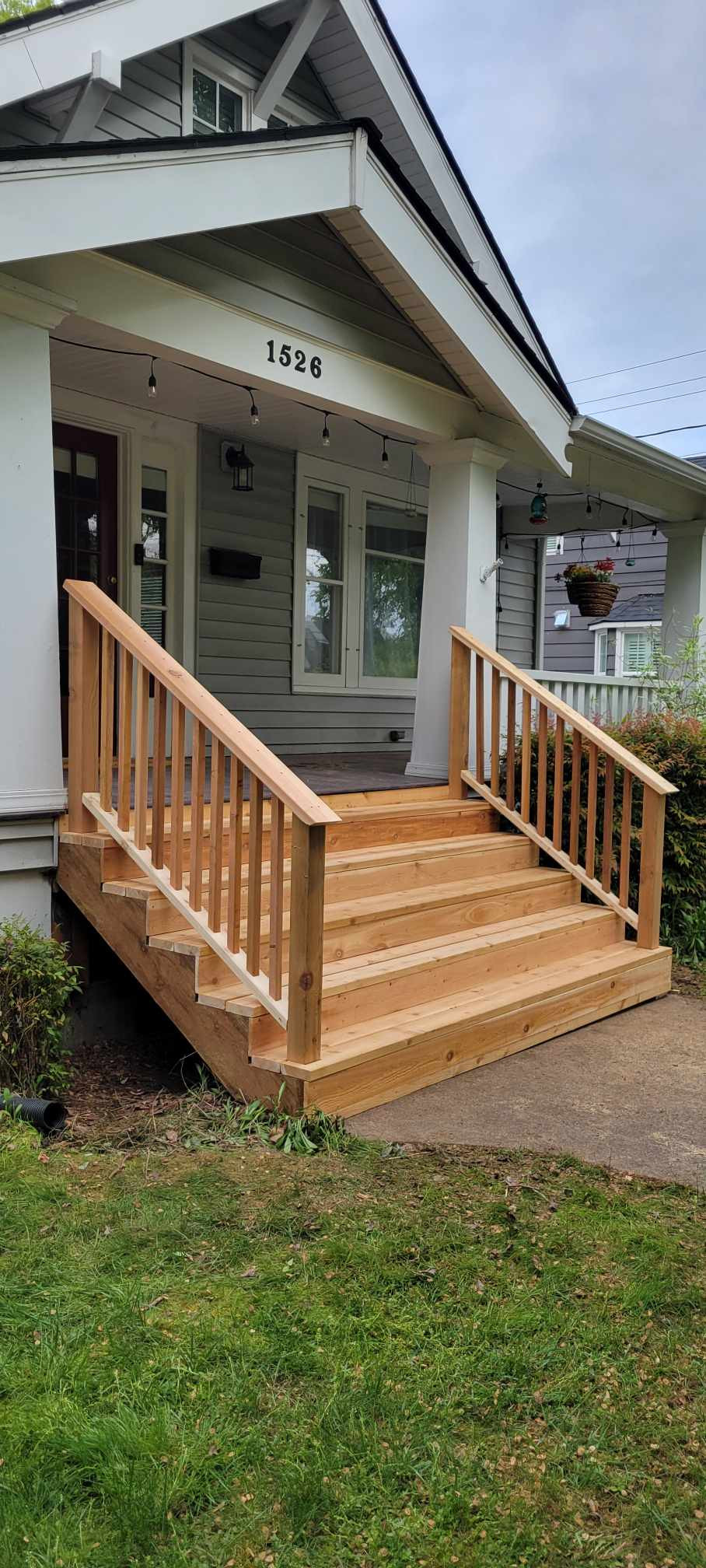 Cedar front steps with cedar railing