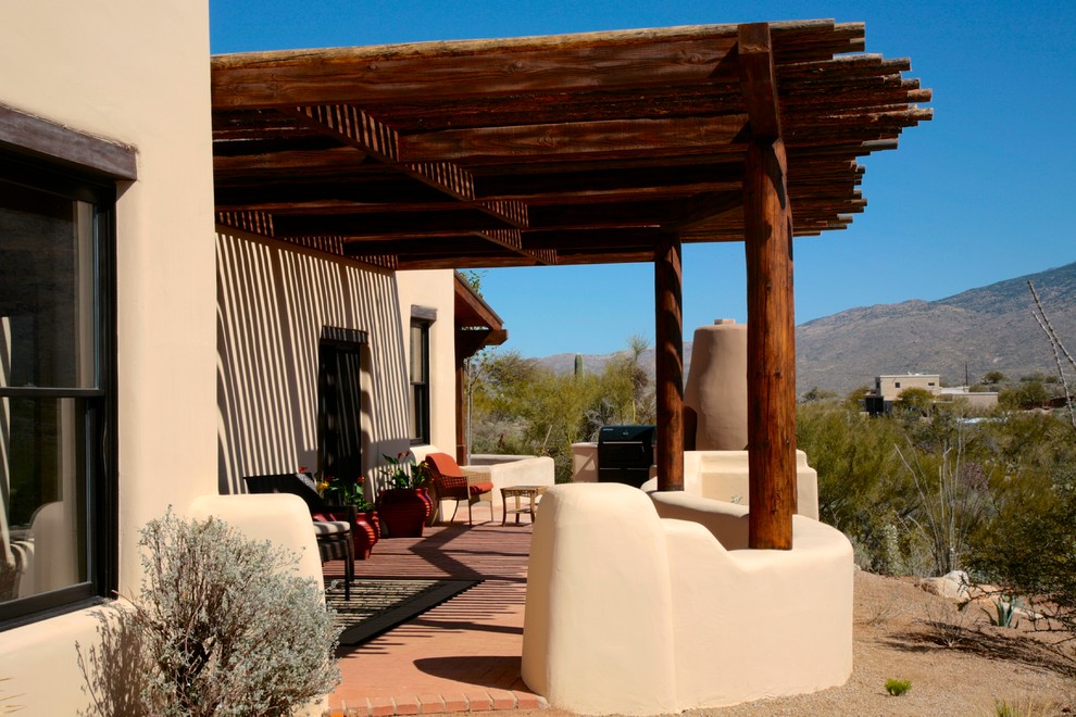 Example of a mountain style home design design in Phoenix