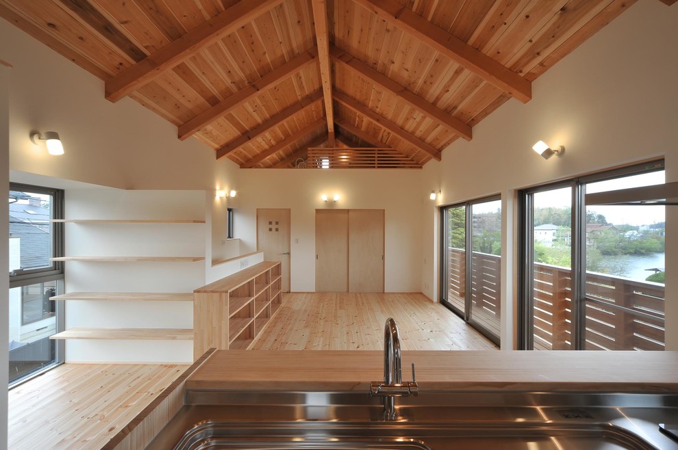 他の地域にあるアジアンスタイルのおしゃれなキッチンの写真