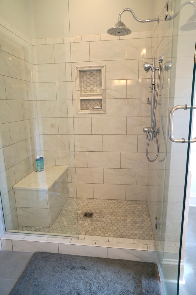 This is an example of a large transitional master bathroom in Louisville with an alcove shower, white tile, ceramic tile, mosaic tile floors, engineered quartz benchtops, grey floor and a hinged shower door.