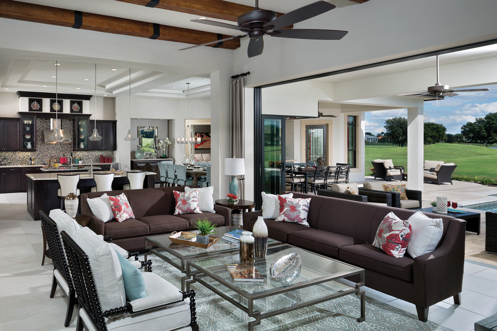 Design ideas for an expansive mediterranean open concept living room in Tampa.
