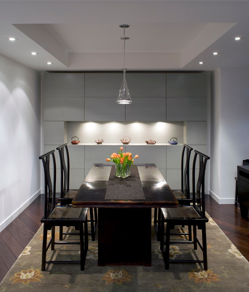Design ideas for a contemporary dining room in DC Metro with white walls and dark hardwood floors.