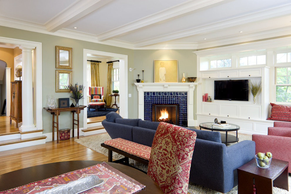 Photo of a traditional living room in Boston with a corner fireplace and a tile fireplace surround.