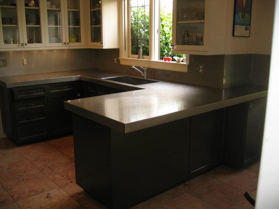 Inspiration for a contemporary kitchen in Seattle with a double-bowl sink.