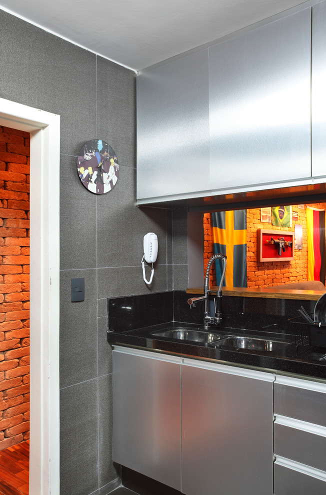 Kitchen - small modern ceramic tile kitchen idea