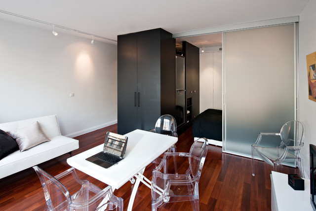 Espace de couchage ind&eacute;pendant dans un studio trendy-dagligstue
