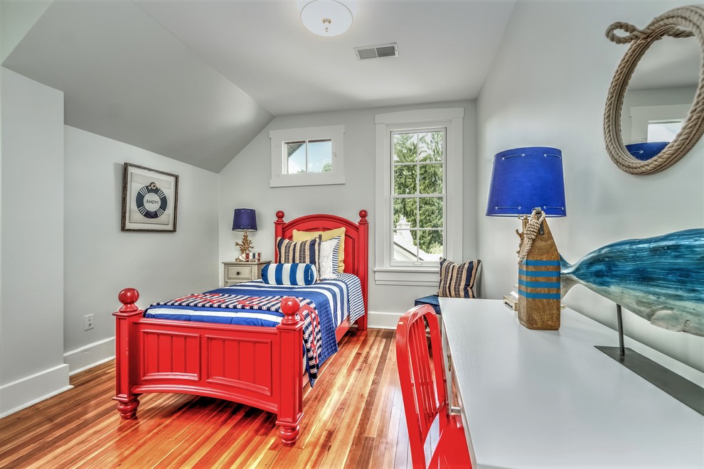 Example of a mid-sized arts and crafts guest dark wood floor and brown floor bedroom design in St Louis with gray walls and no fireplace