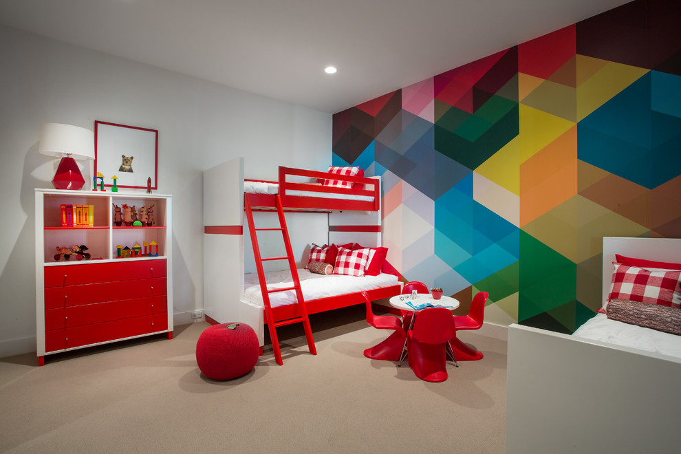 This is an example of a contemporary gender-neutral kids' bedroom for kids 4-10 years old in Salt Lake City with multi-coloured walls and carpet.