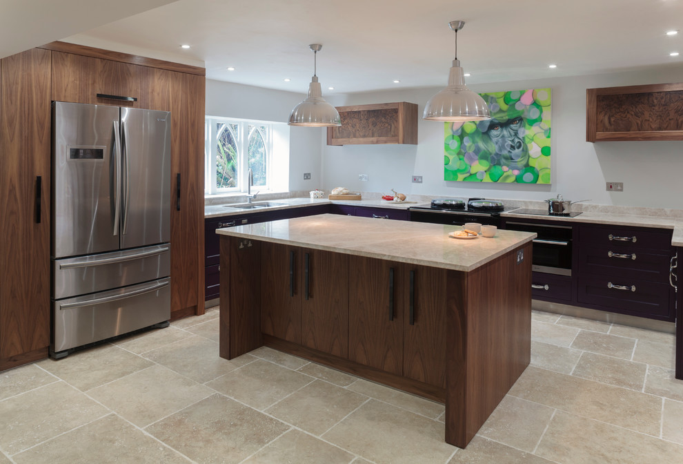 Contemporary kitchen in Wiltshire with recessed-panel cabinets, black cabinets and stainless steel appliances.