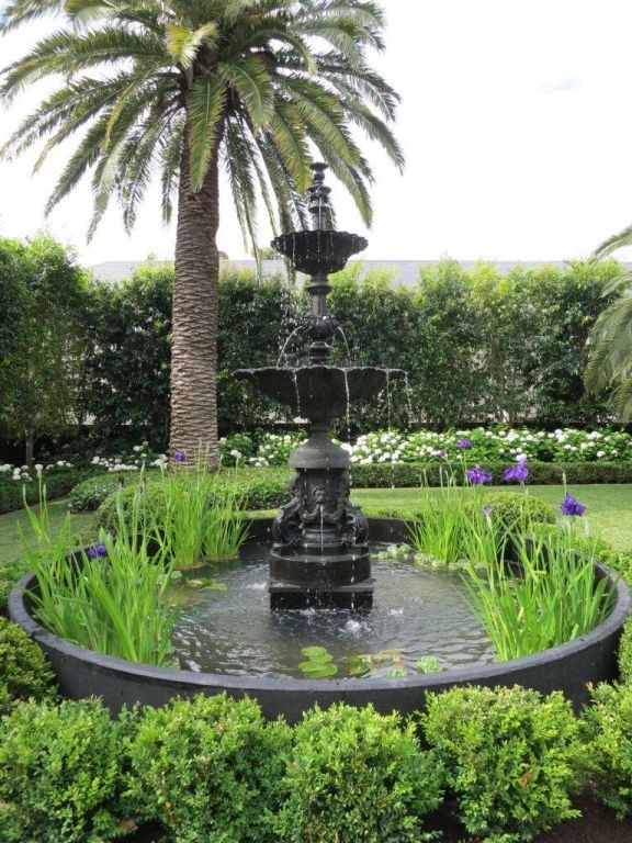 Traditional garden in Melbourne with a water feature.
