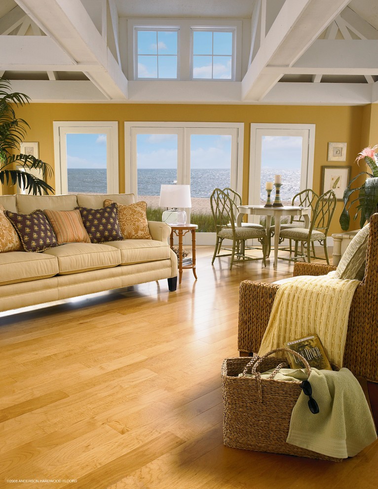 Inspiration for a mid-sized beach style formal enclosed living room in Other with brown walls, vinyl floors, no tv, brown floor and no fireplace.