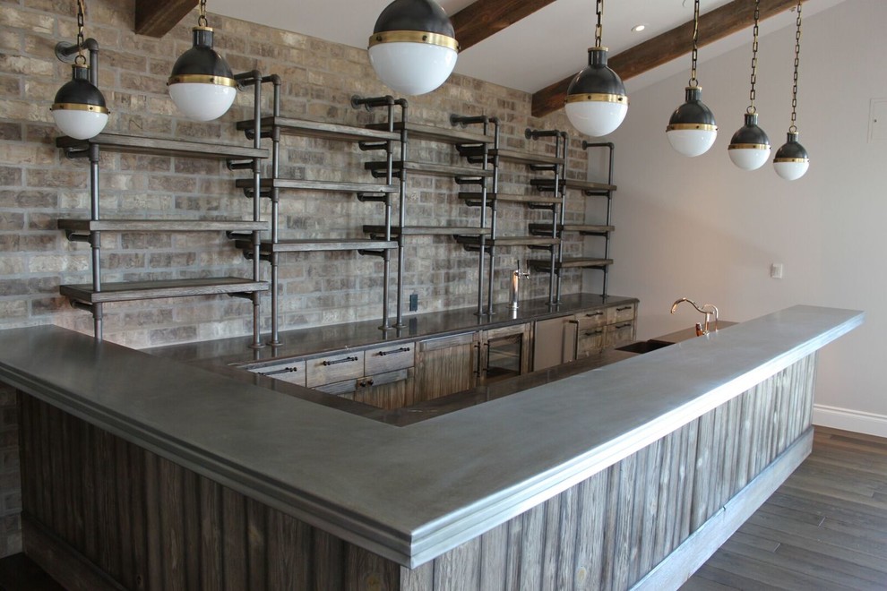 Inspiration for a country home bar in Phoenix with distressed cabinets, limestone benchtops and light hardwood floors.