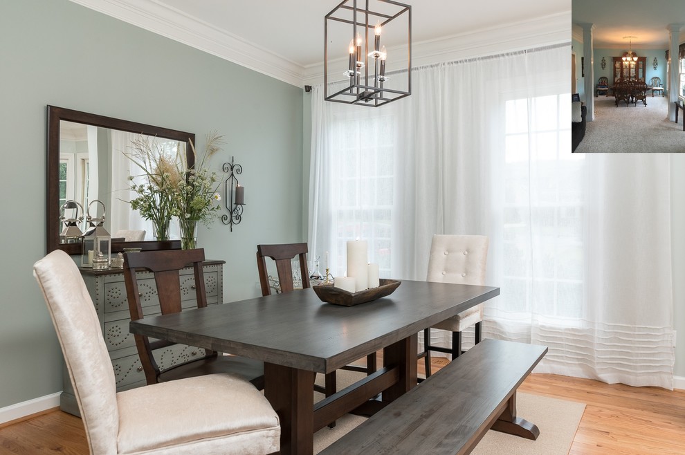 Inspiration for a large transitional dining room in Other with green walls and medium hardwood floors.