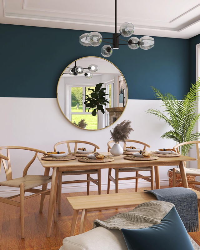 Bild på en mellanstor 50 tals matplats med öppen planlösning, med blå väggar, laminatgolv, en öppen vedspis, en spiselkrans i trä och brunt golv