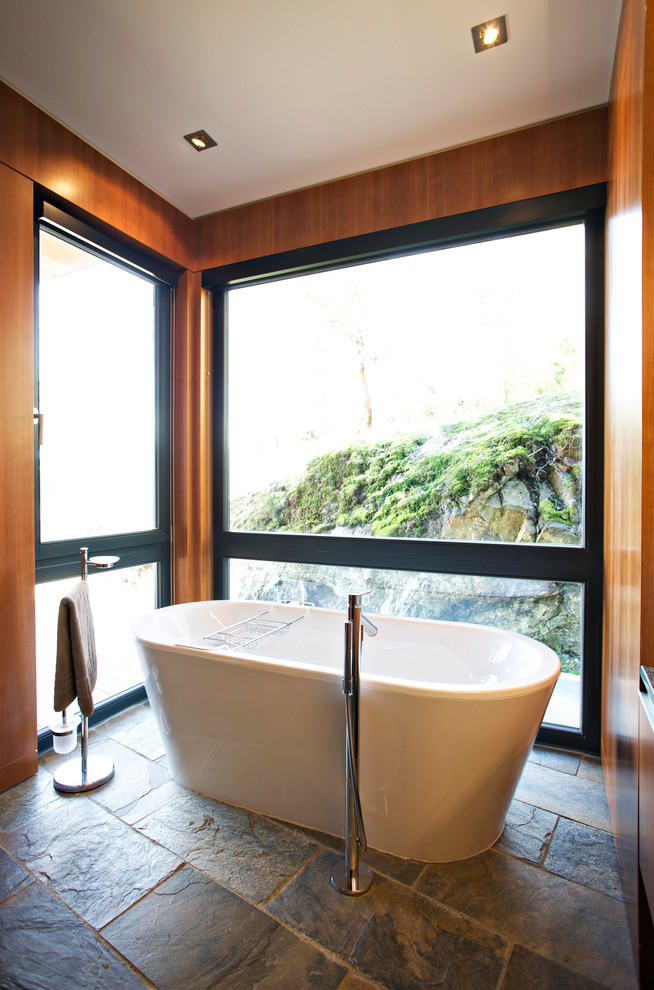 Contemporary bathroom in Vancouver with a freestanding tub.