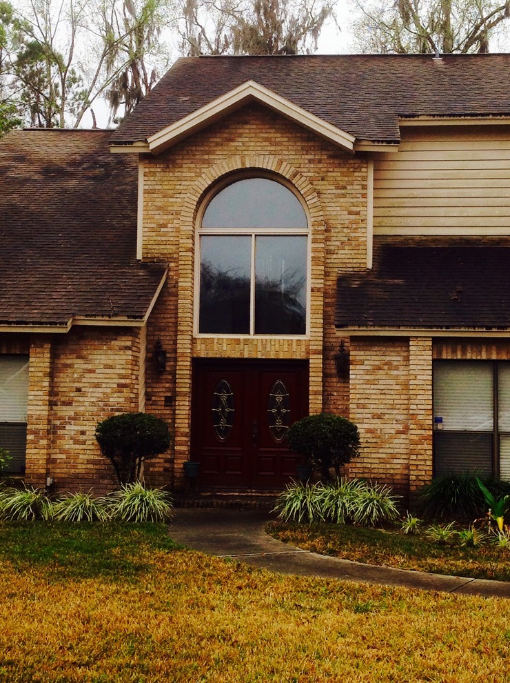 Help! 1980s brick and slanted siding home needs inexp facelift, porch?