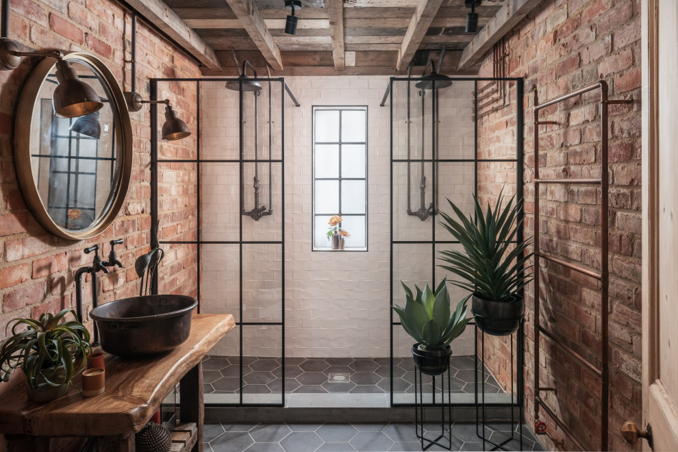 Inspiration for a medium sized country shower room bathroom in Hampshire with medium wood cabinets, a walk-in shower, ceramic flooring, a console sink, wooden worktops, grey floors, an open shower, a single sink, a freestanding vanity unit, exposed beams and brick walls.