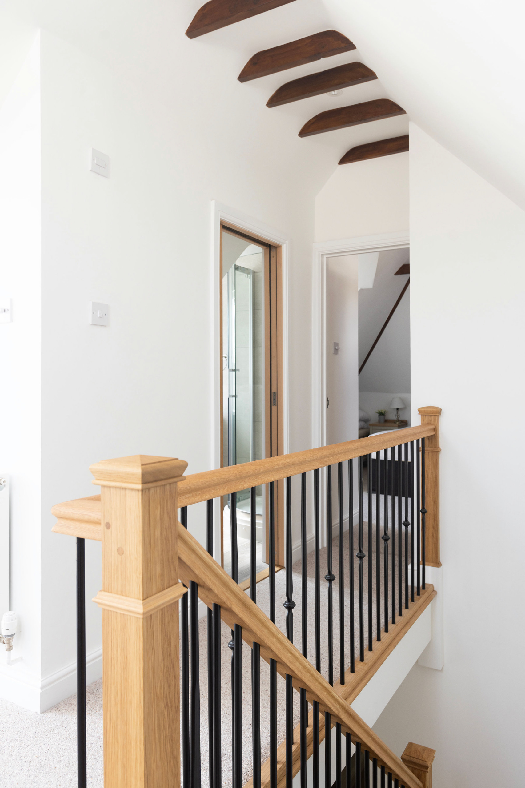 View of landing and stair banister details