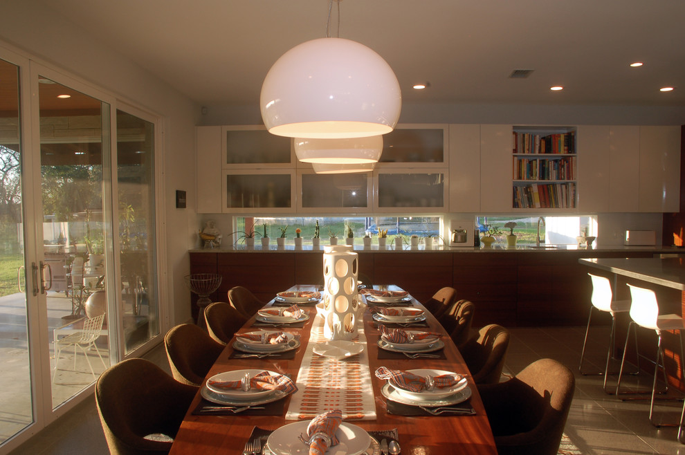 Photo of a modern dining room in Austin.