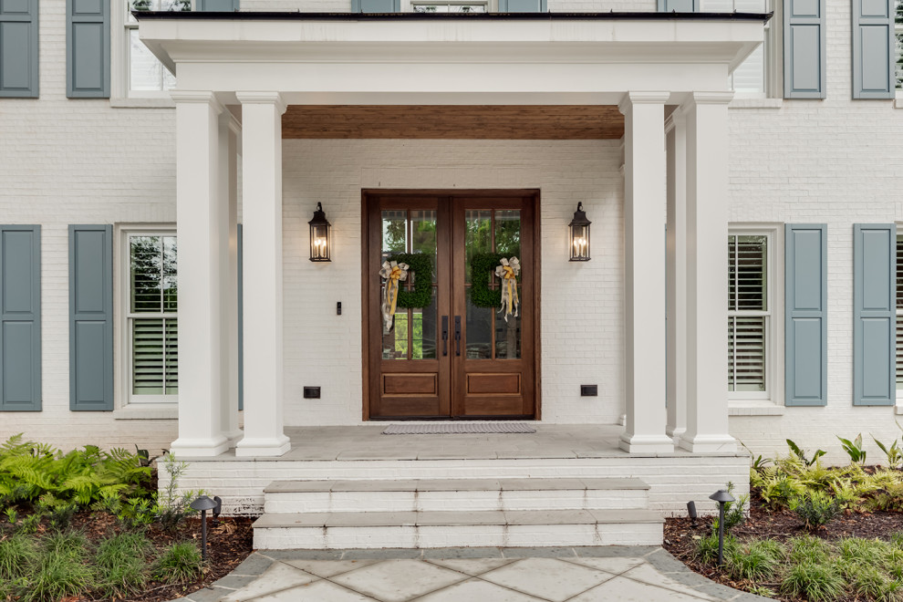 Front door - transitional front door idea with a medium wood front door