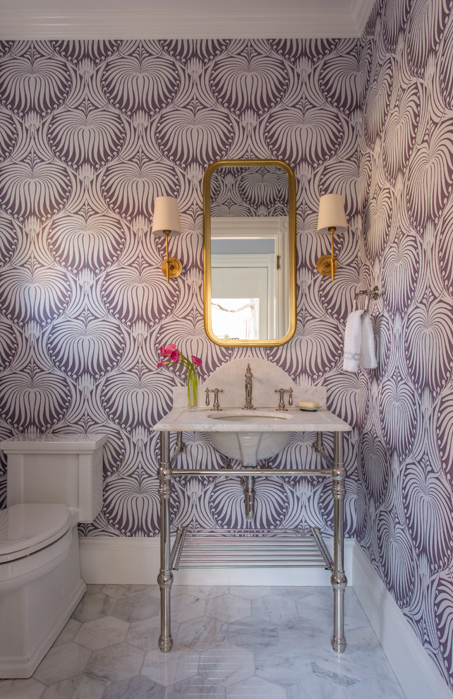 Inspiration for an eclectic powder room in Boston with open cabinets, a one-piece toilet, white tile, purple walls, marble floors, a console sink and marble benchtops.