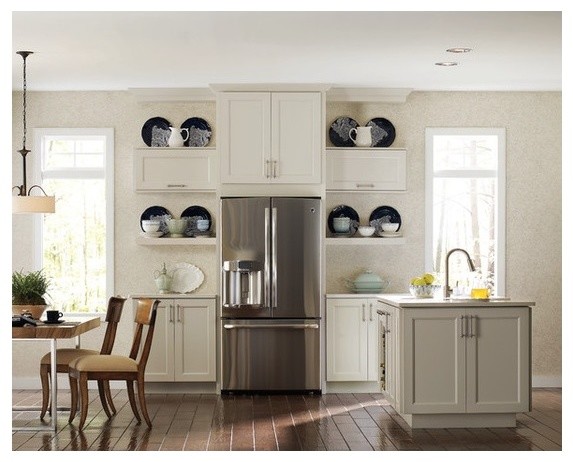 Kitchen - small transitional dark wood floor kitchen idea in Toronto with shaker cabinets, white cabinets, quartz countertops, stainless steel appliances and an island