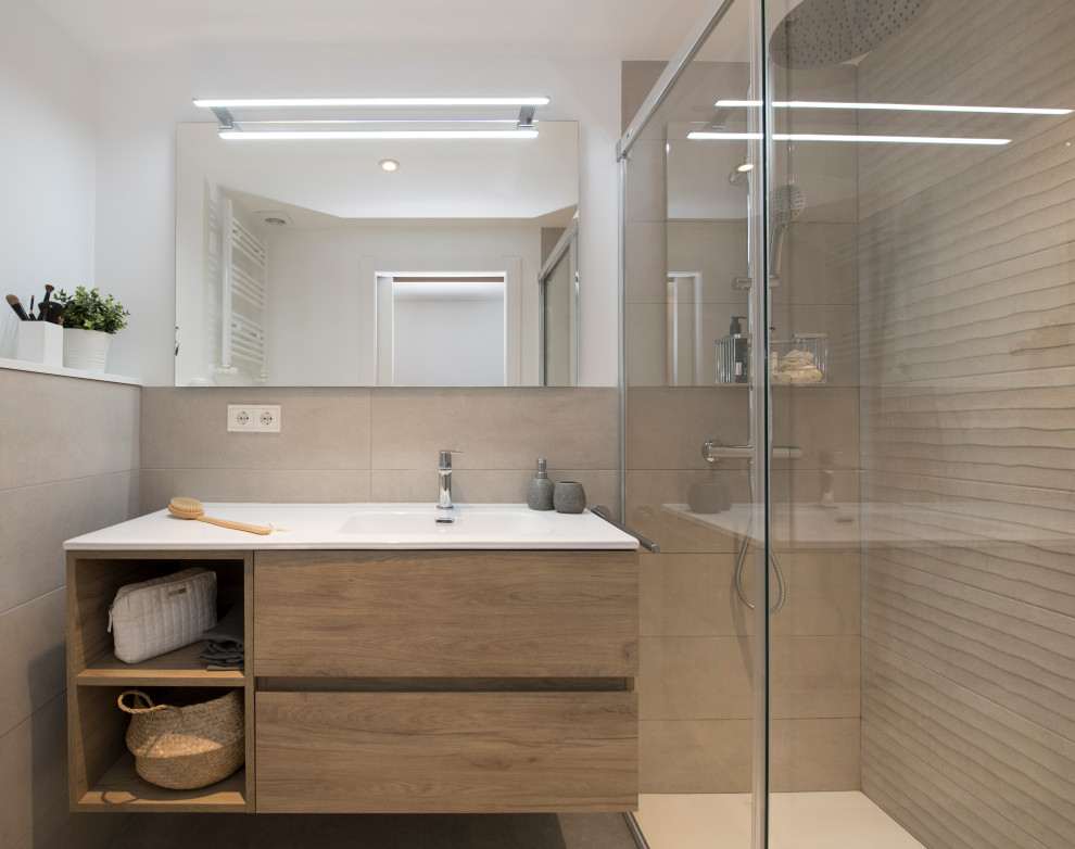 Photo of a mid-sized scandinavian master bathroom in Other with beige cabinets, a wall-mount toilet, beige tile, porcelain tile, grey walls, porcelain floors, grey floor, a hinged shower door and white benchtops.