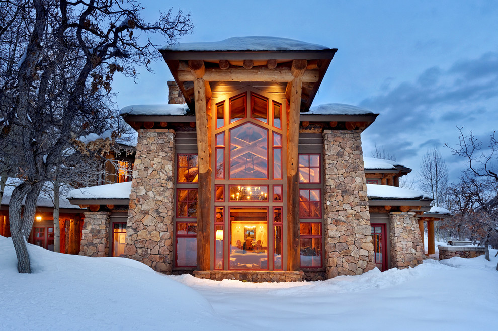 Country exterior in Denver with stone veneer.