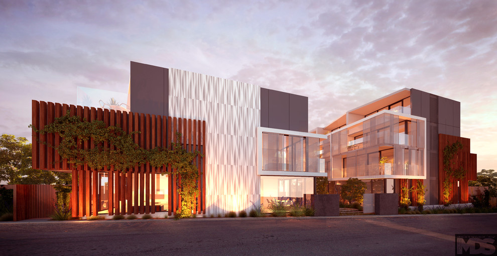 Photo of a large contemporary three-storey grey exterior in Melbourne with wood siding and a flat roof.