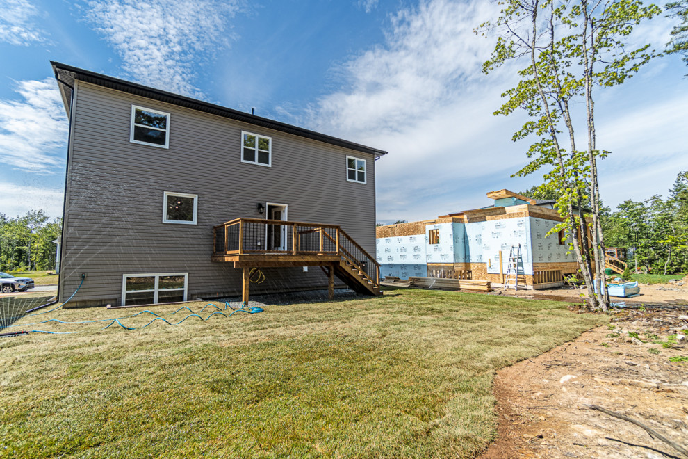 Example of a small transitional backyard deck design