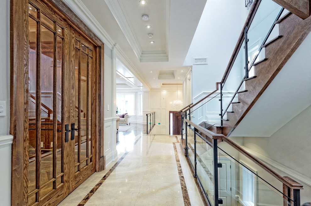 Transitional home design photo in Toronto