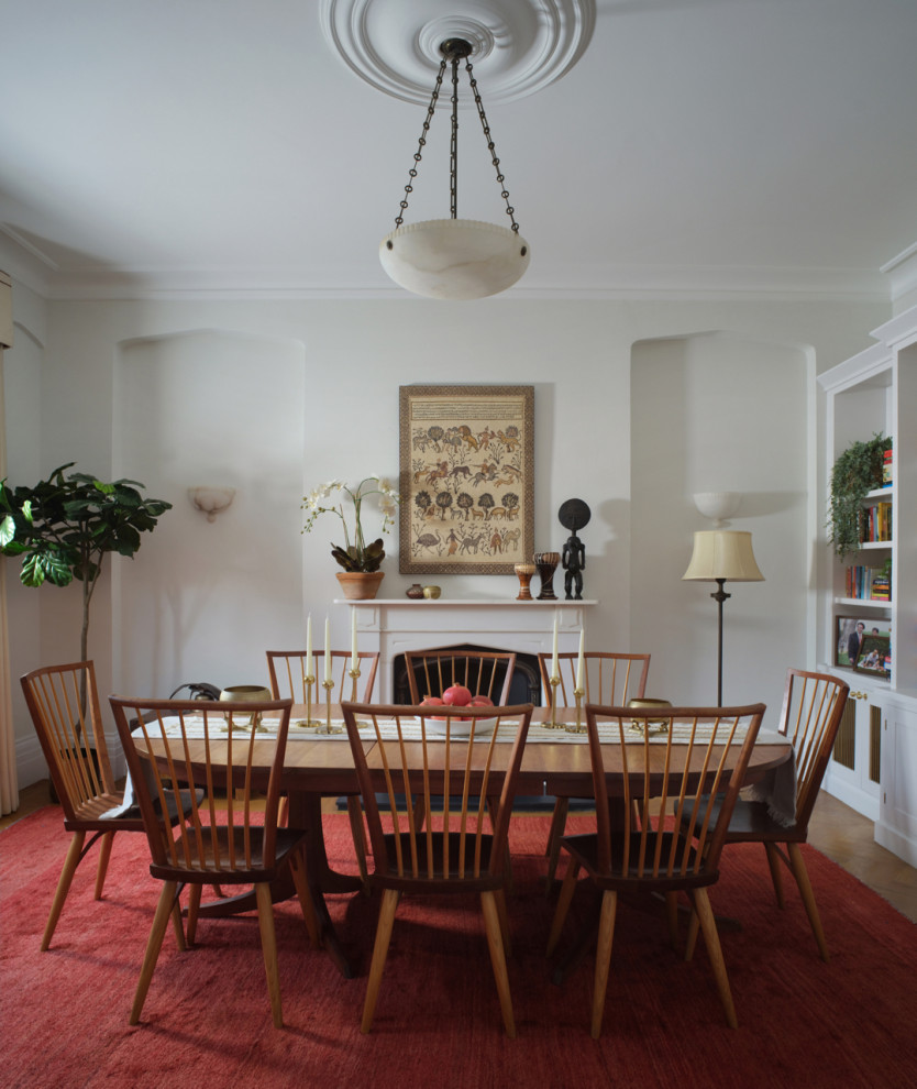 Design ideas for a midcentury dining room in Other.