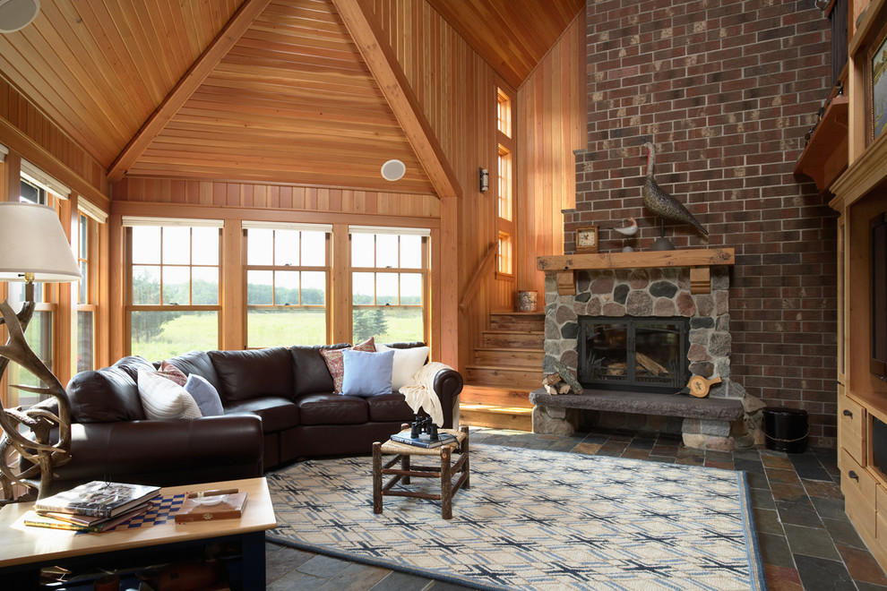Photo of a country living room in Minneapolis with slate floors.