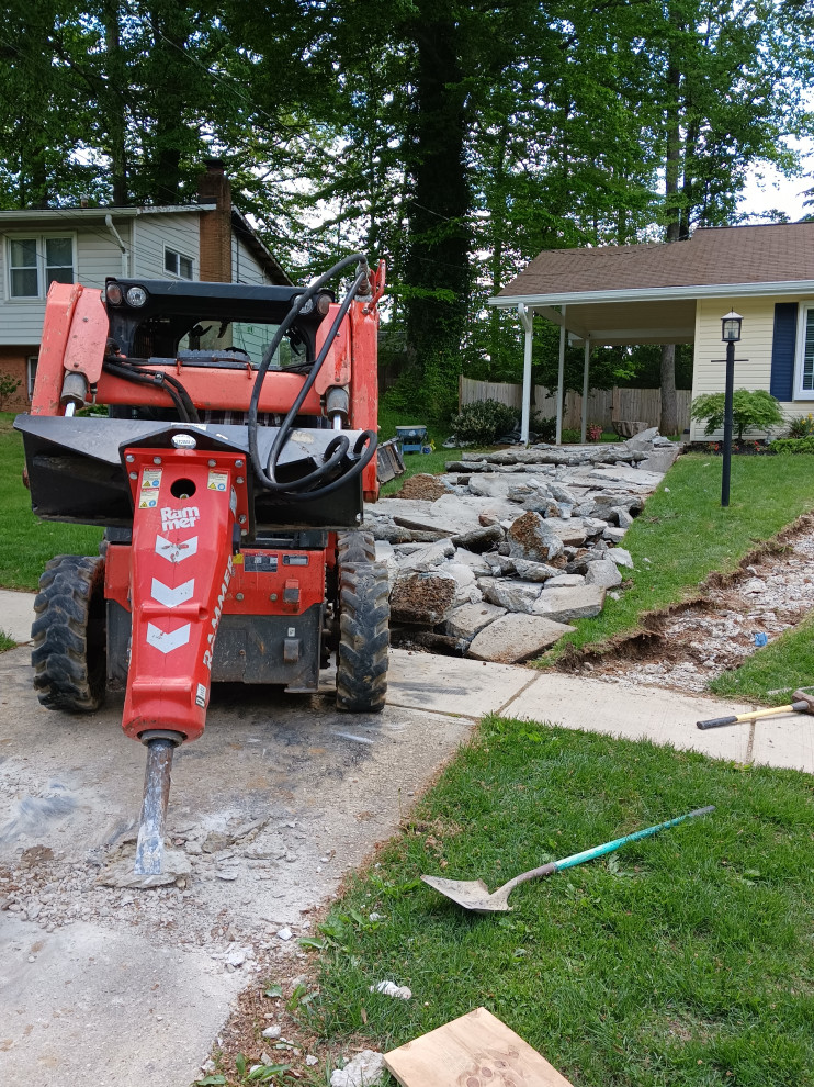 Concrete driveway , concrete patio , steps ,and landing