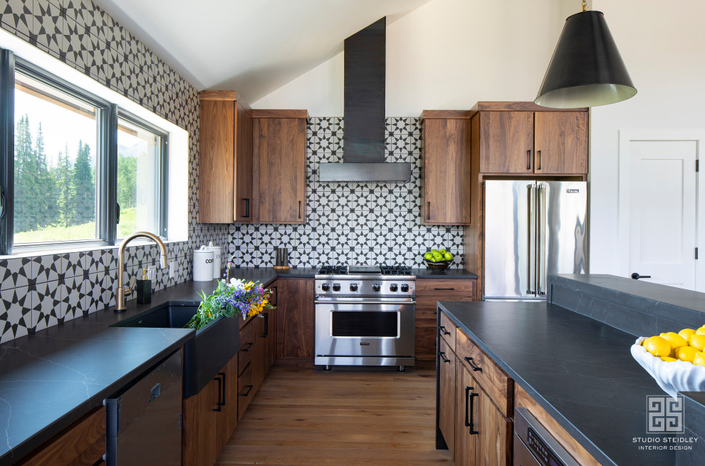 Example of a mountain style kitchen design in Denver