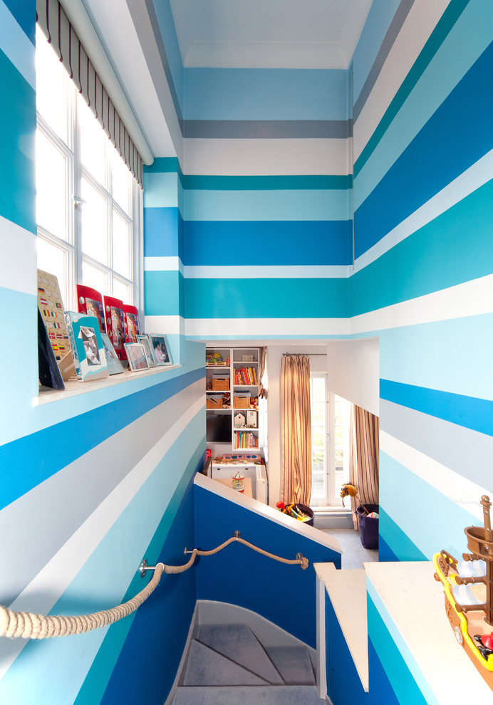Inspiration for a contemporary kids' room in London with multi-coloured walls.