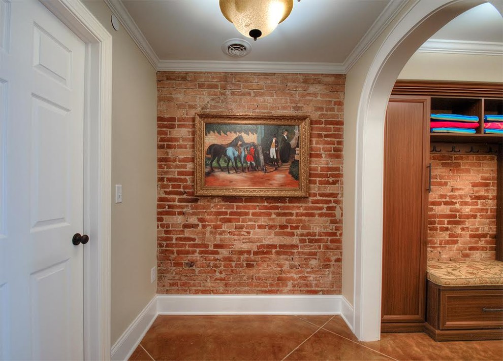 Photo of a mid-sized country hallway in New York with red walls.