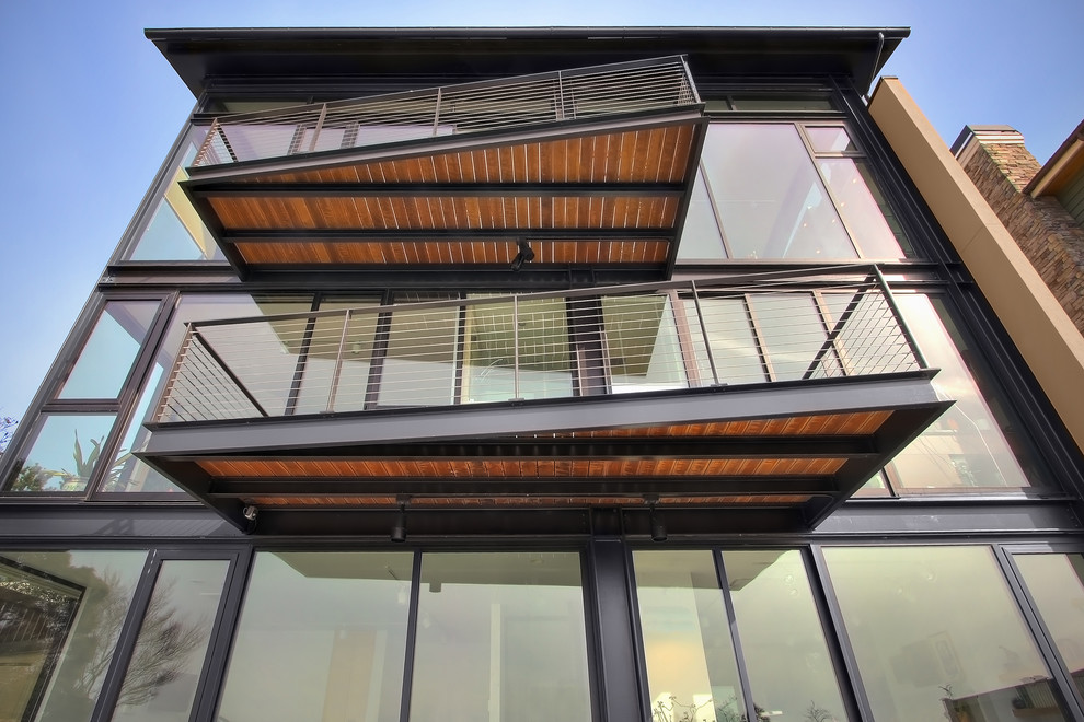 Contemporary three-storey glass exterior in Seattle.