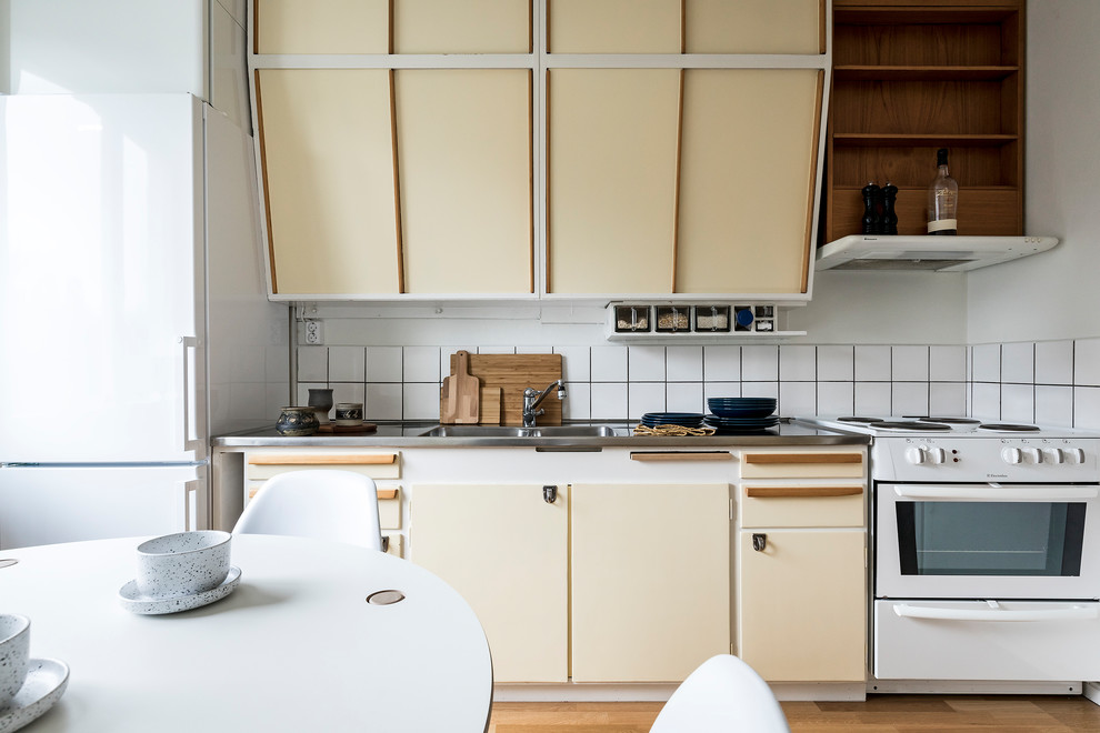 This is an example of a small scandinavian kitchen in Stockholm.